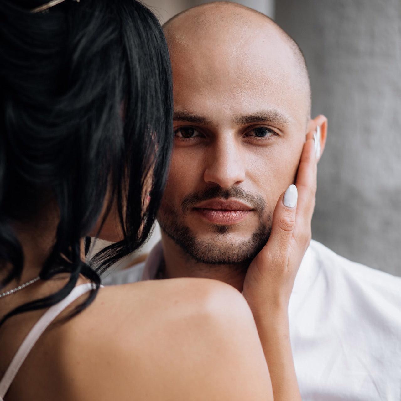 a woman dating a bald man
